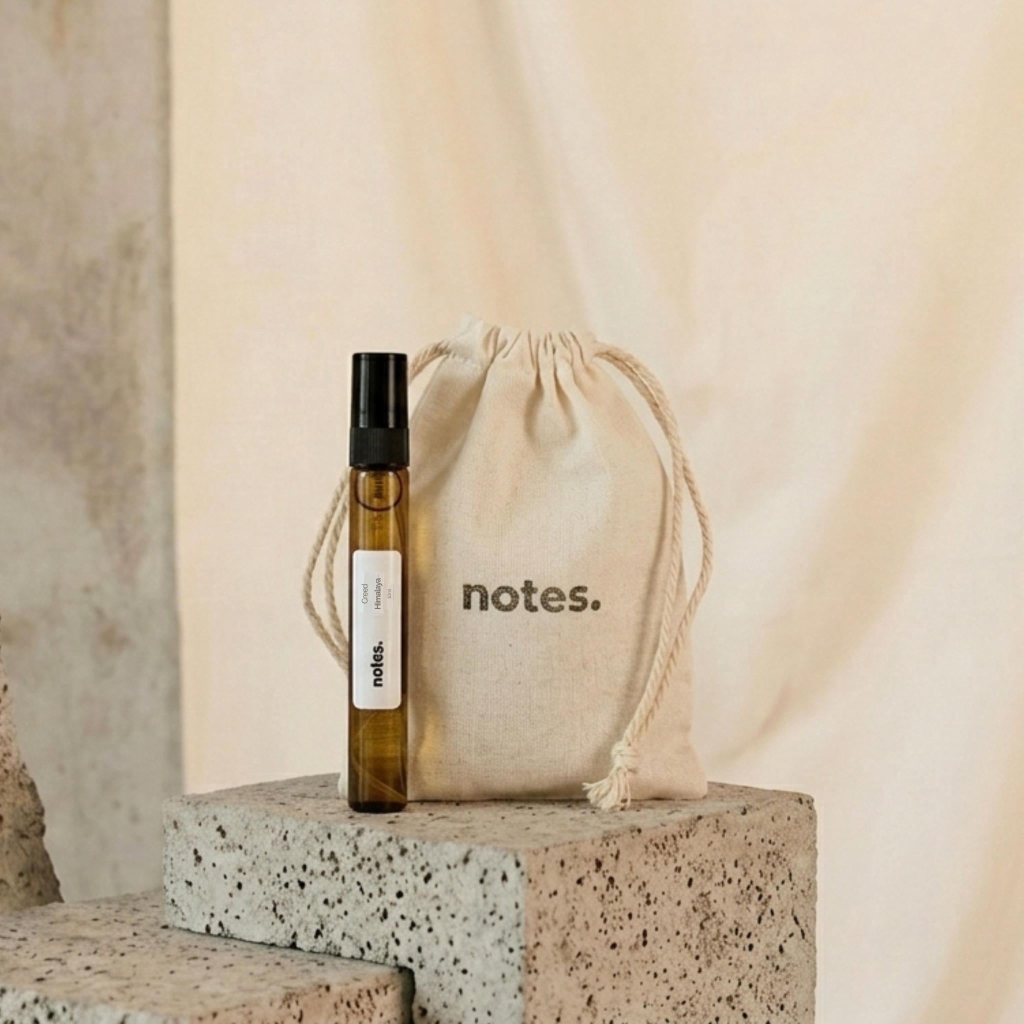 notes. 10ml fragrance decant vial with cotton drawstring pouch